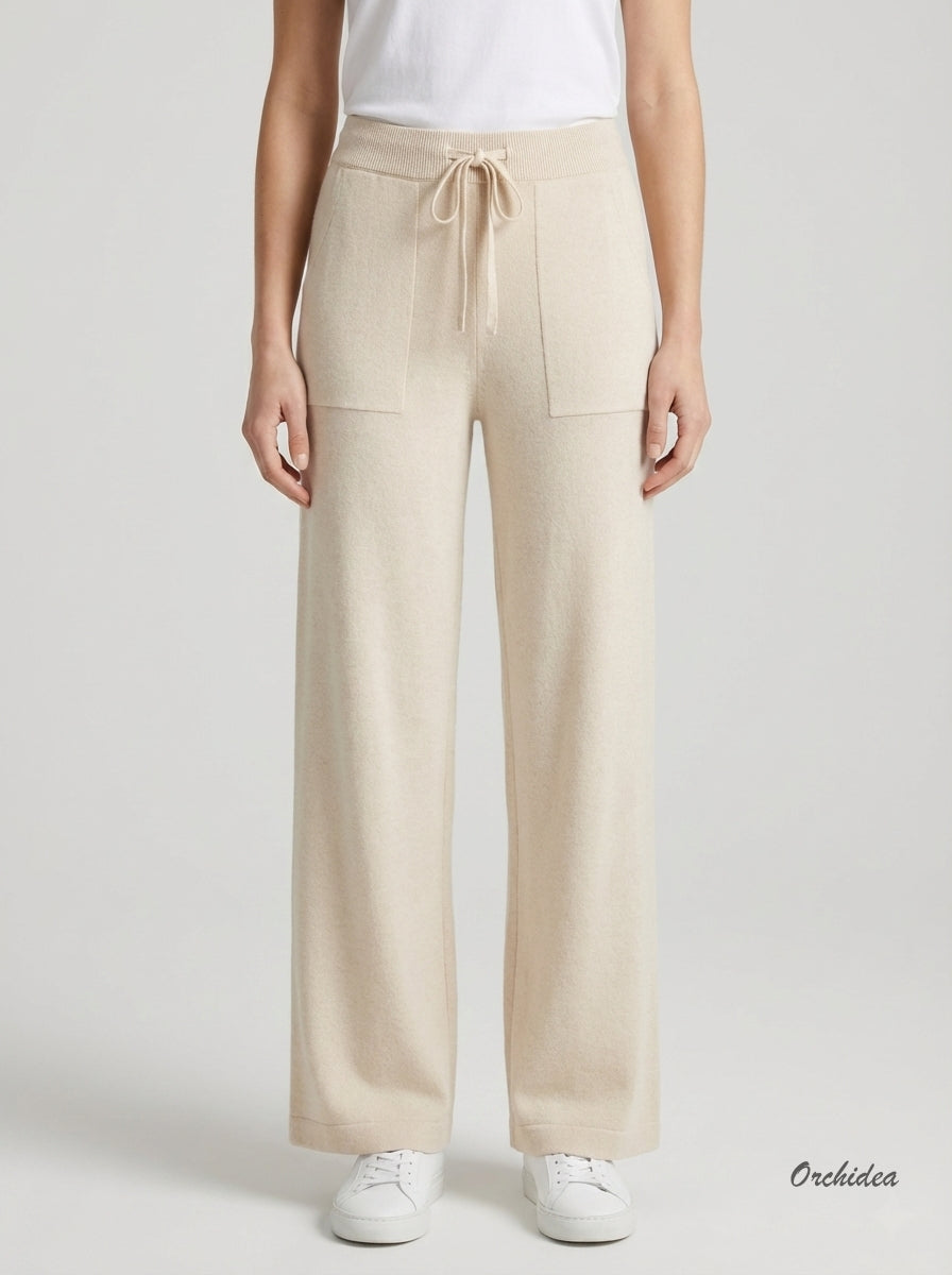 Krémové pletené kalhoty s kapsami