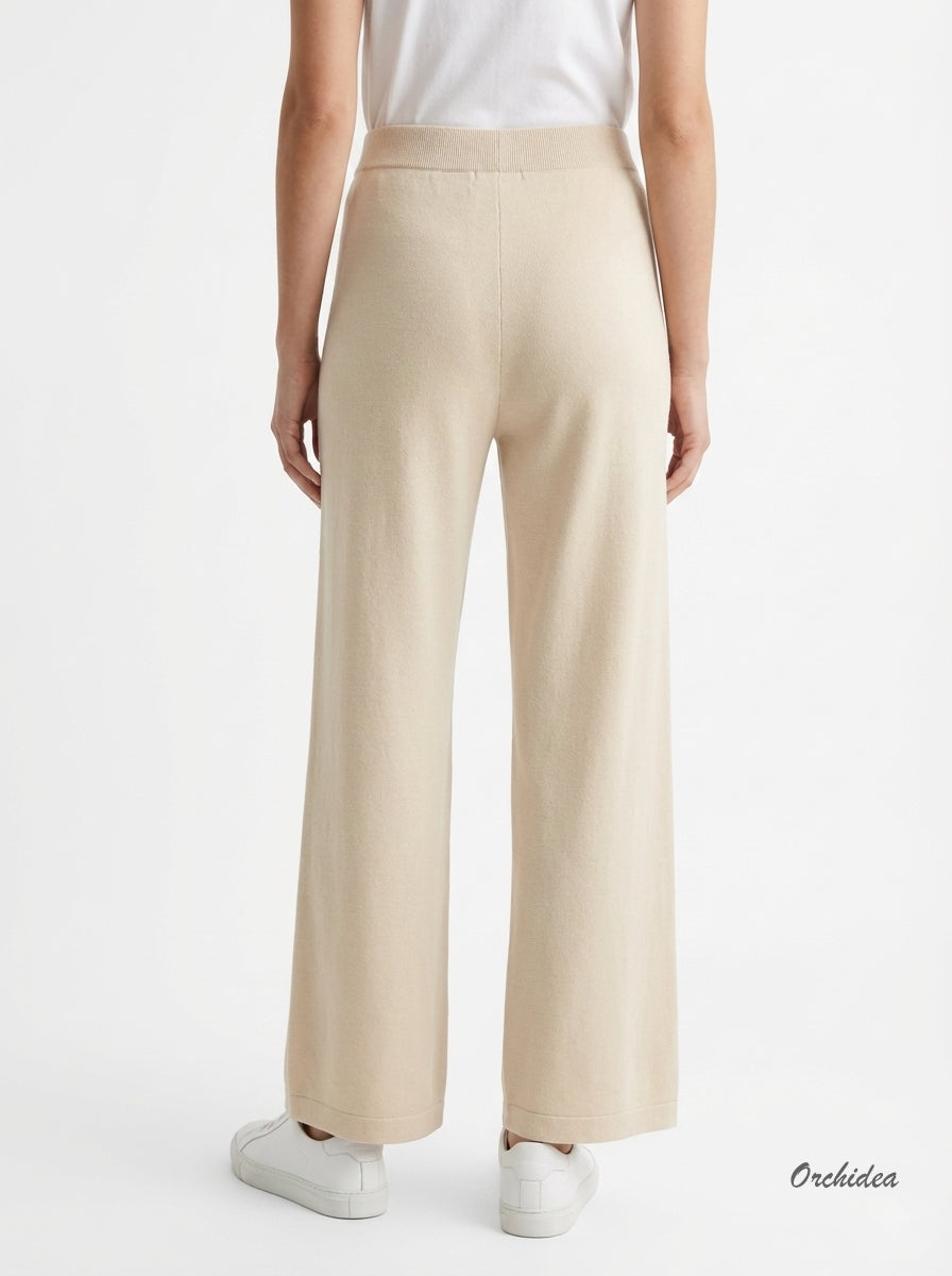 Krémové pletené kalhoty s kapsami