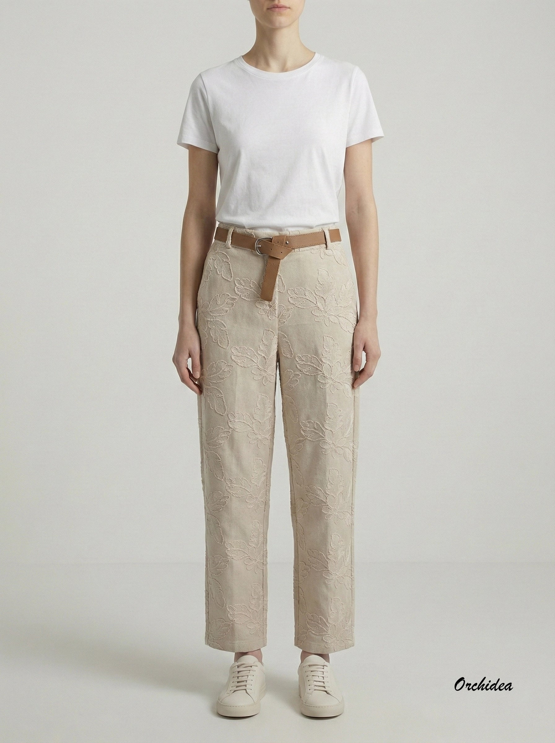 Béžové vyšívané kalhoty