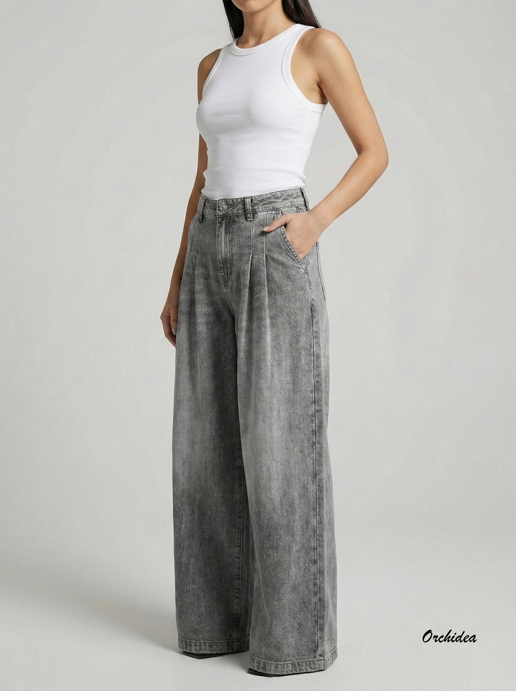 Šedé široké džíny s puky a „washed“ efektem