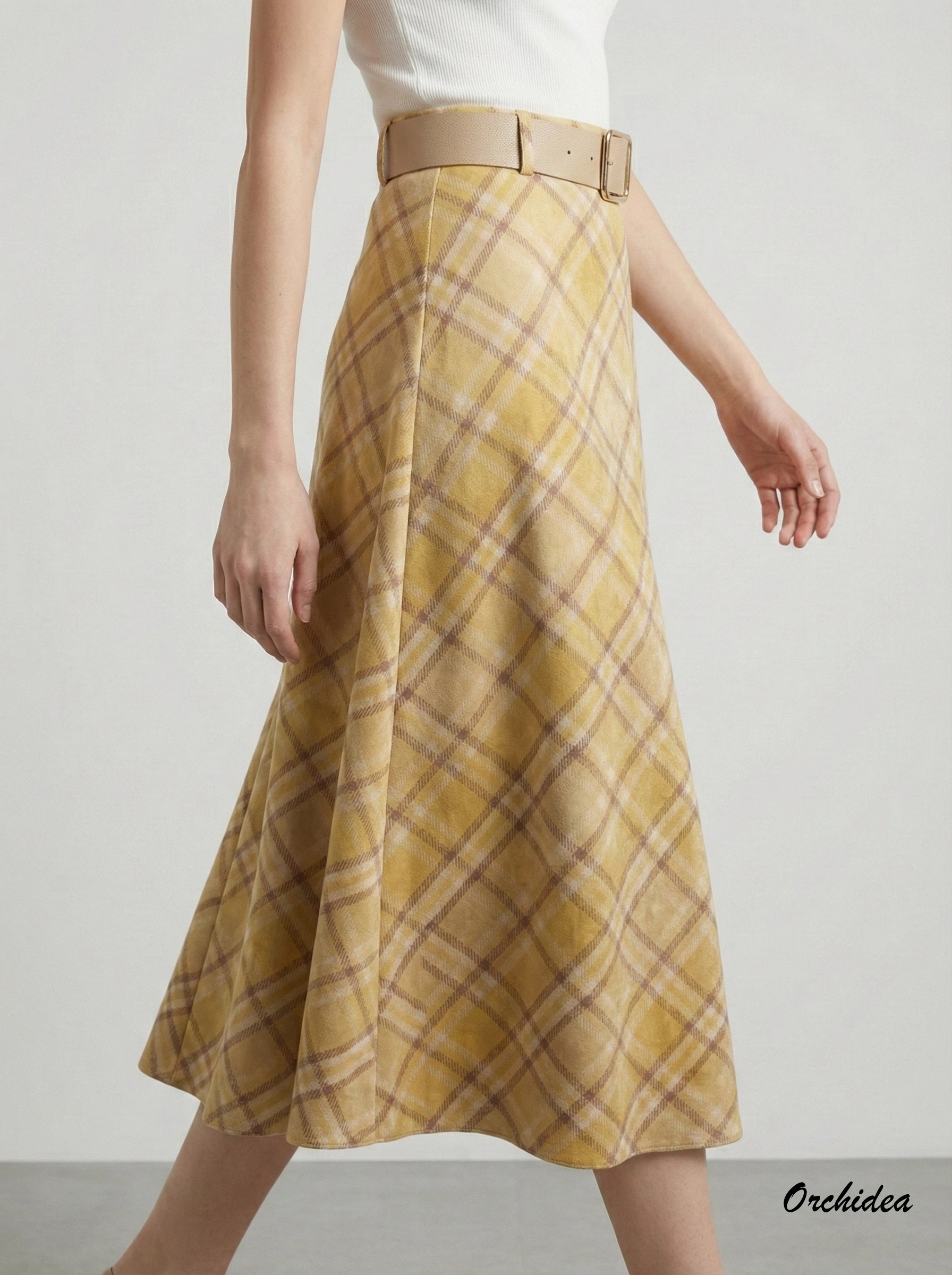 Žlutá károvaná sukně s páskem